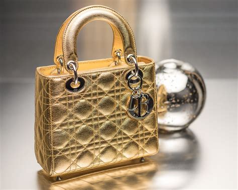 gold dior handbag|christian dior purse.